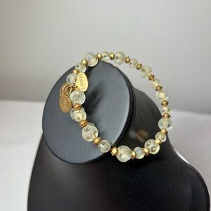 Alex and Ani wrap bracelet. Gold tone and clear beads